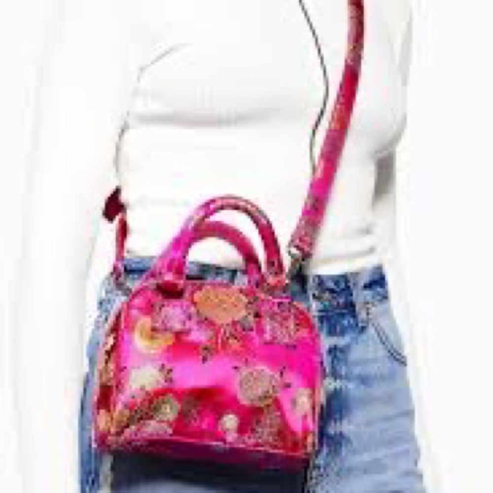 Pink satin oriental floral bag.